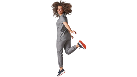 Nurse jumping in the air wearing a pair of Toffeln SmartSole Breeze shoes